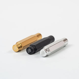 Set of Blackwing point guards in gold, matte black, and silver metal