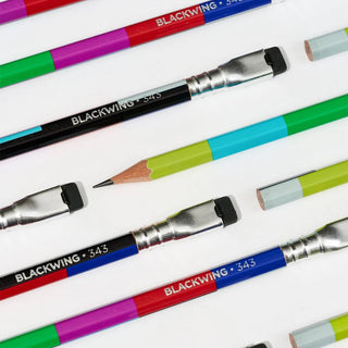 Assorted Blackwing Volume 343 pencils with silver metal ends and green and purple barrels