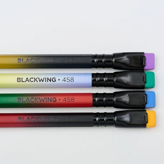 Blackwing Volume 458 pencils close-up, four colored barrels with black grips