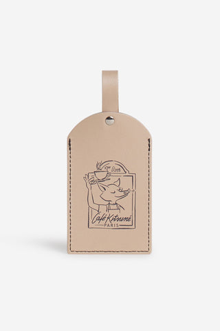 Café Kitsuné leather luggage tag with fox graphic and stitched edges