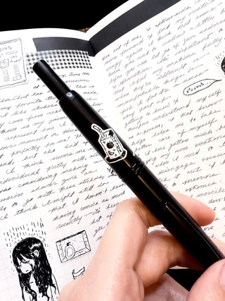 Sticker sheet close-up with shower figure, bottle graphic, and handwritten-style notes