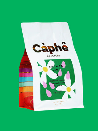 Càphê Roasters Sixth Street Gold Blend coffee bag, 12 oz, white pouch with green label