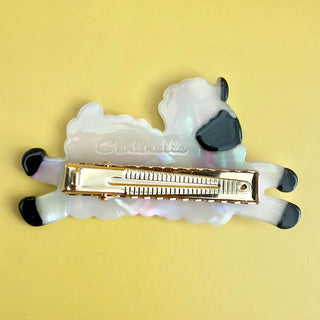 Sheep-themed hair clip with gold metal alligator spring and iridescent white body