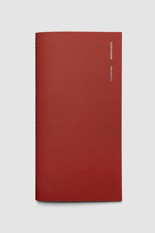 Red A5 slim travel notebook with logo on cover