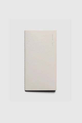 Light beige blank travel notebook with stitched back cover