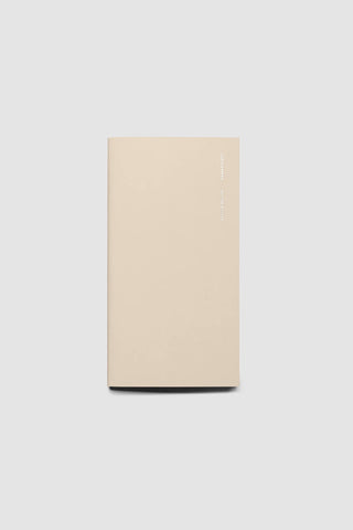 Beige pocket travel notebook with routine planner cover