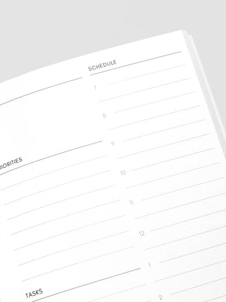 Daily planner lines with headings: Schedule and Tasks, numbered sections visible.