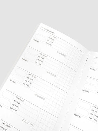 Open A5 notebook pages with pen swatch layout and grid sections
