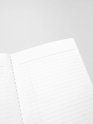 A5 slim travel notebook page with ruled lines and dotted binding edge