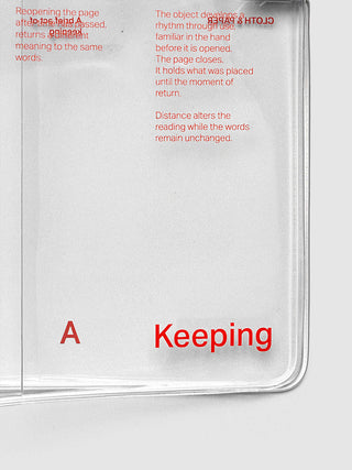 Clear vinyl notebook cover back panel with red cord closure