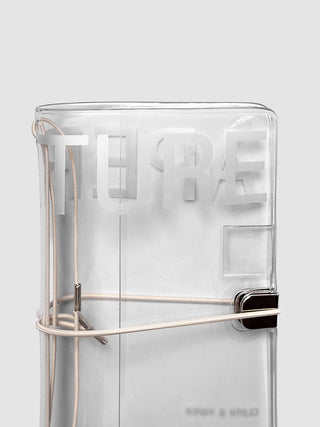 Clear vinyl notebook cover with aperture pocket, pen loop, and metal rings, open view
