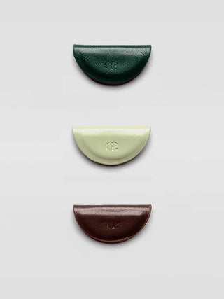 Mini magnetic bookmark trio with curved halves in dark green, light green, and dark brown