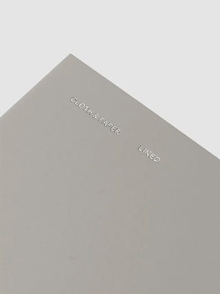Gray Cloth & Paper travel notebook cover, embossed logo and 'LINED' text