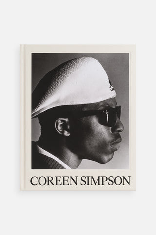 Portrait photography monograph book cover with grayscale profile headshot and Coreen Simpson title