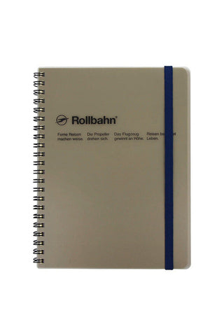 Grey spiral notebook with Rollbahn logo and blue edge band