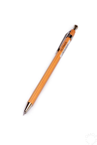 Orange wood ball pen with metal ballpoint tip and brown wood end cap