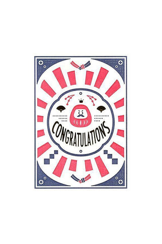 Congratulations card with daruma-style face in circular red-and-white badge design