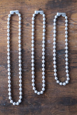 Large silver-tone ball chain necklace with round bead links and open loop ends