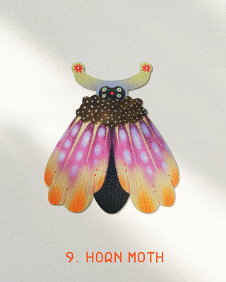 Glitter Horn moth sticker with black body and orange-yellow wing tips