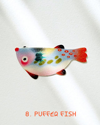 Glitter Puffer fish sticker in white with red fins and colorful dots