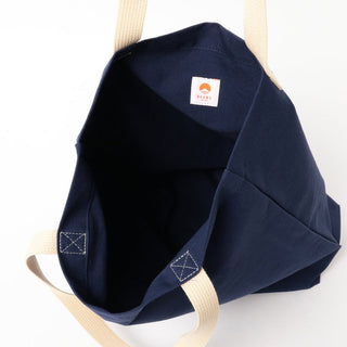 Indigo tote bag with black interior pocket and BEAMS JAPAN label patch