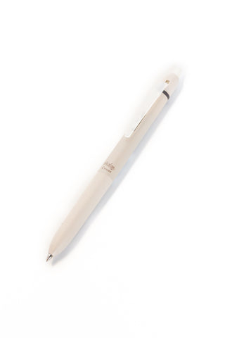 Erasable pen with light beige barrel and pointed metal tip