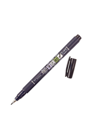 Dark blue calligraphy brush pen with hard tip and matching cap