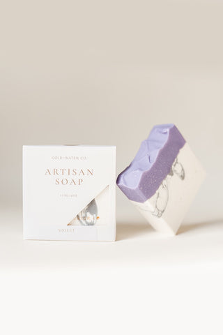 Handcrafted violet soap bar with white gift box and paper wrap