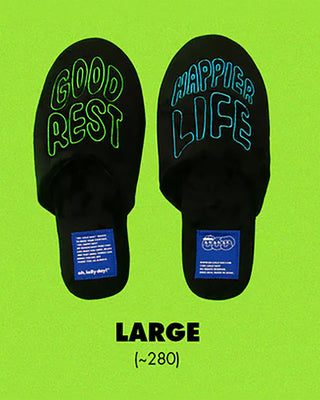 Large rest room shoes, black with neon “Good Rest” and “Happier Life” text, blue tags