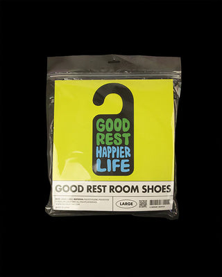 Packaged rest room shoes in clear bag with neon “Good Rest Happier Life” label, Large