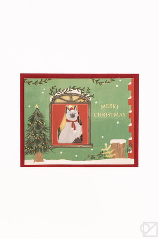 Christmas pop-up card front: cat in window, red border, 'Merry Christmas' text