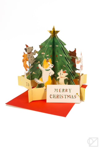 Pop-up Christmas card: green tree, dancing dogs, 'Merry Christmas' front panel