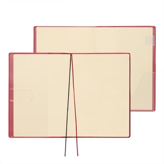 A5 weekly planner open flat, beige pages with red elastic bands and dark center seam