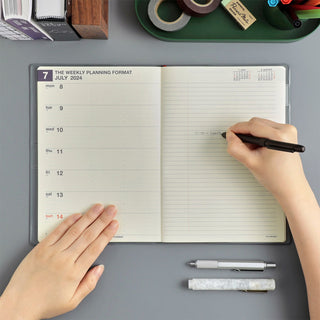 HIGHTIDE A5 weekly minute manager planner, open pages with day grid and lines