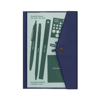 Navy A5 monthly planner with tabbed folder and colorful planner insert inside