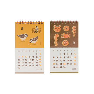 Set of two retro desk calendars: month 5 birds and month 9 pastry illustration