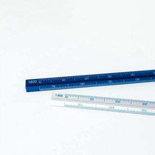 Blue aluminum metric drafting scale with white and blue scale markings