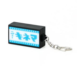 Light-up retro keychain sign with blue film title, black housing and chain