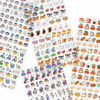 White sticker sheet with colorful icons, animals, food, and character stickers
