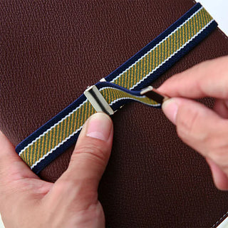 Wide adjustable book band fastened with silver clasp on striped elastic strap
