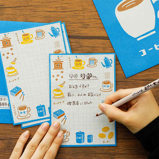 Cafe-themed letter set with blue cards, coffee doodles, and handwritten note