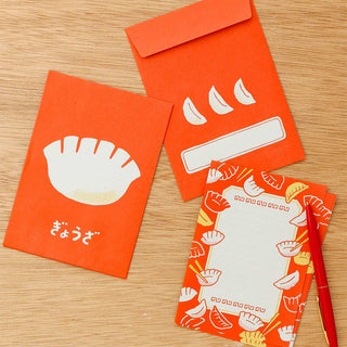 Orange letter set envelopes and cards with graphic icon and repeating utensil border