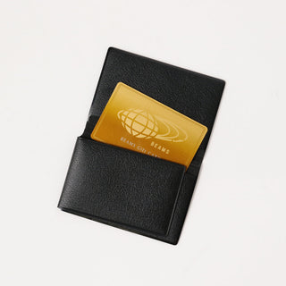 Black card case with foldover design and gold BEAMS graphic patch