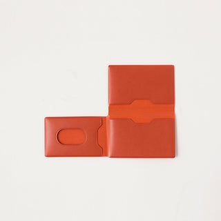 Orange leather card case open view with two compartments