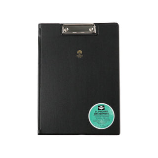Black clipboard with silver metal clip and round brand badge on front