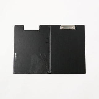 Black open clipboard with silver metal clip at top and inner writing surface