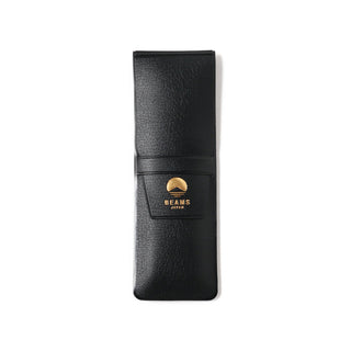 Black leather-look pen case with BEAMS Japan logo patch and wrap flap.