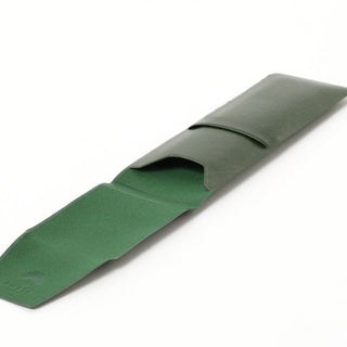 Green pen case open view showing interior pocket and BEAMS Japan logo patch