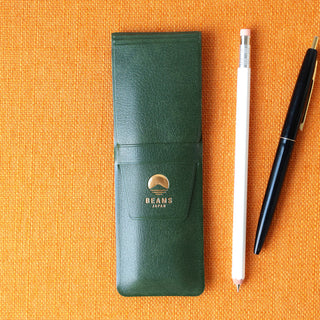 Green leather-look pen case with snap front; BEAMS Japan logo and pen shown