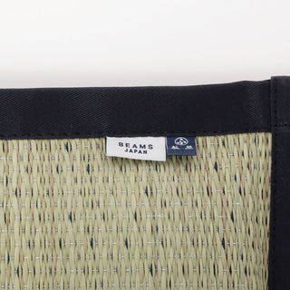 Navy cushion corner with woven texture and BEAMS JAPAN logo tag patch